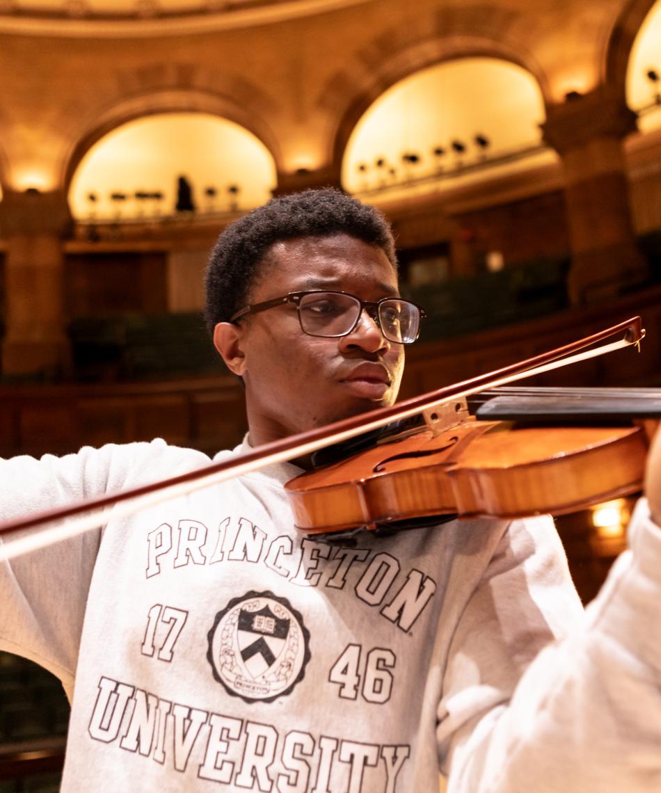 Student playing a violin