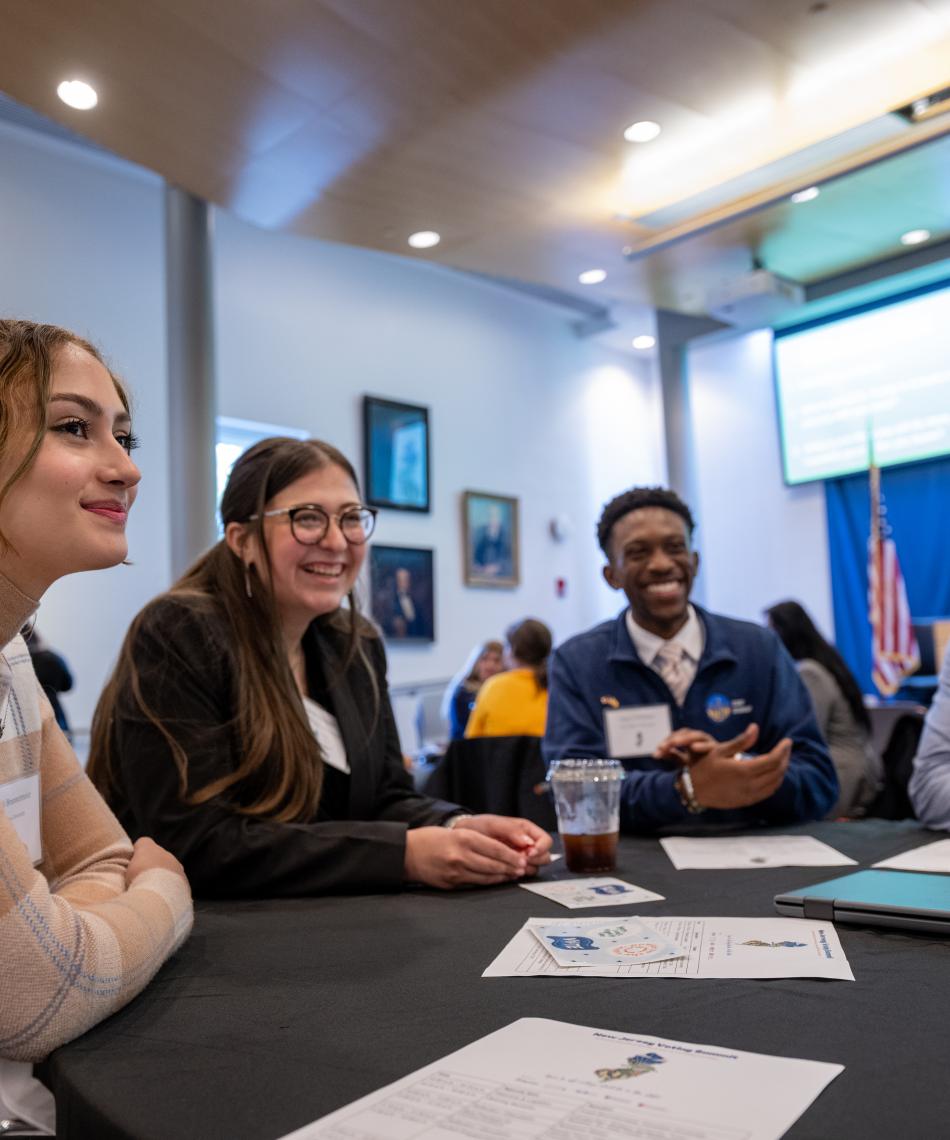 students sitting at a table