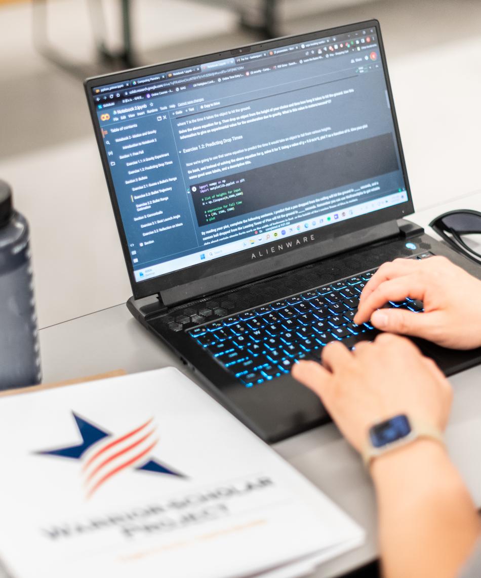 ROTC student on a laptop