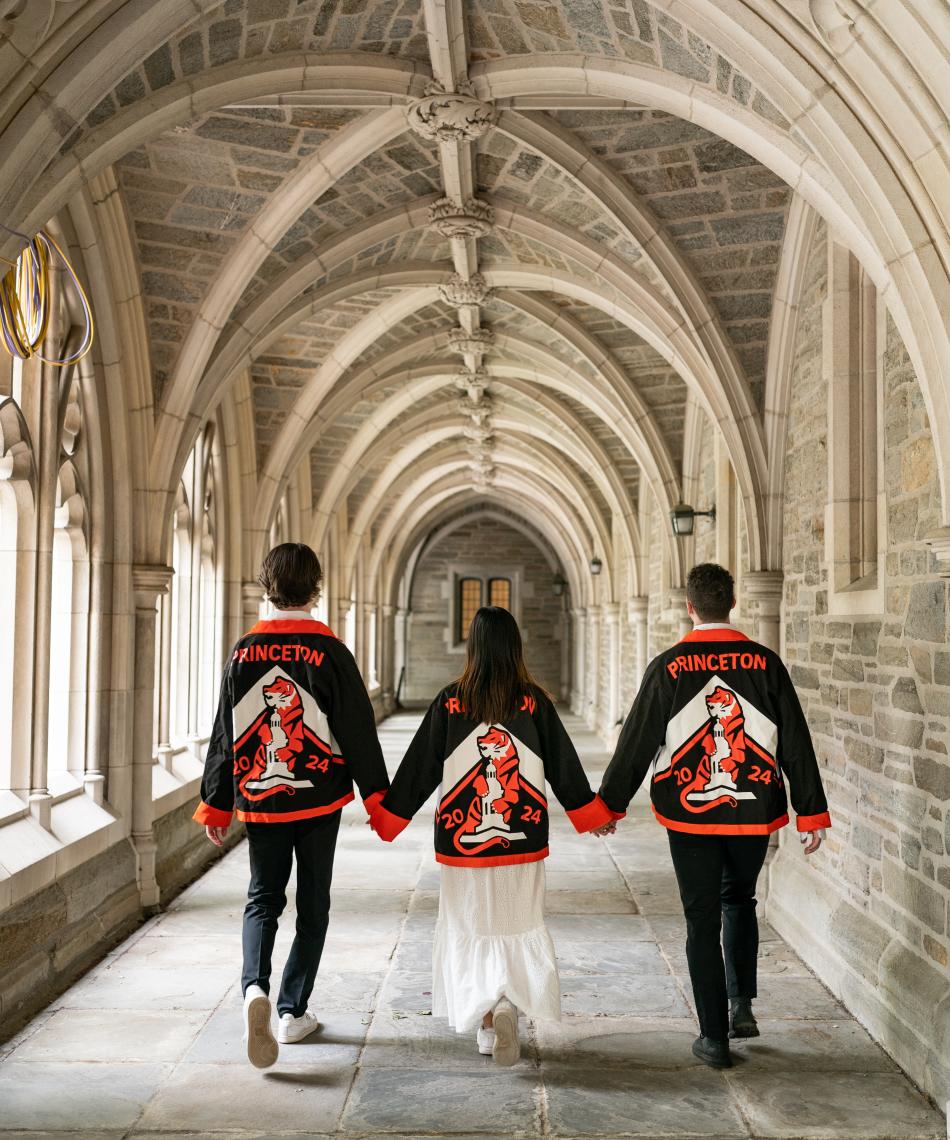 Students walking with Princeton jackets