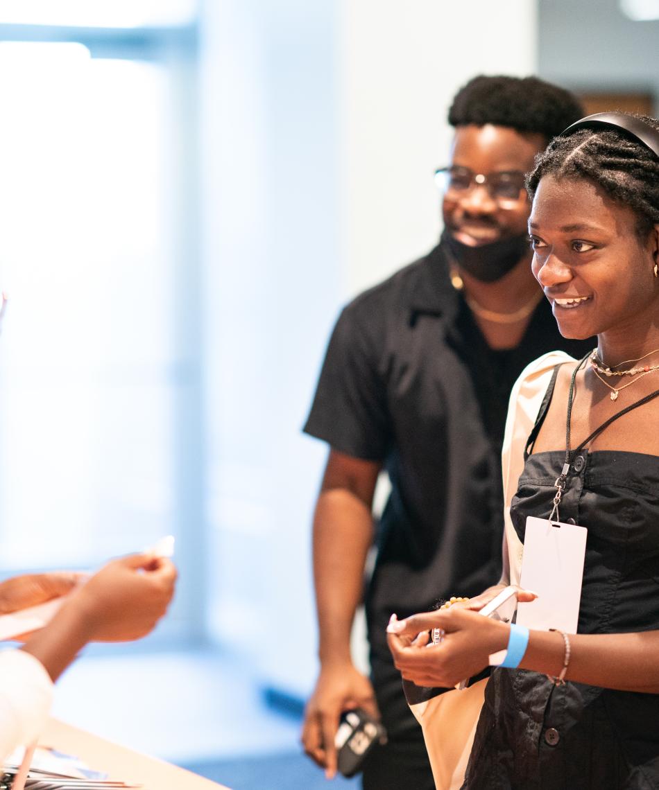 Students checking into an event