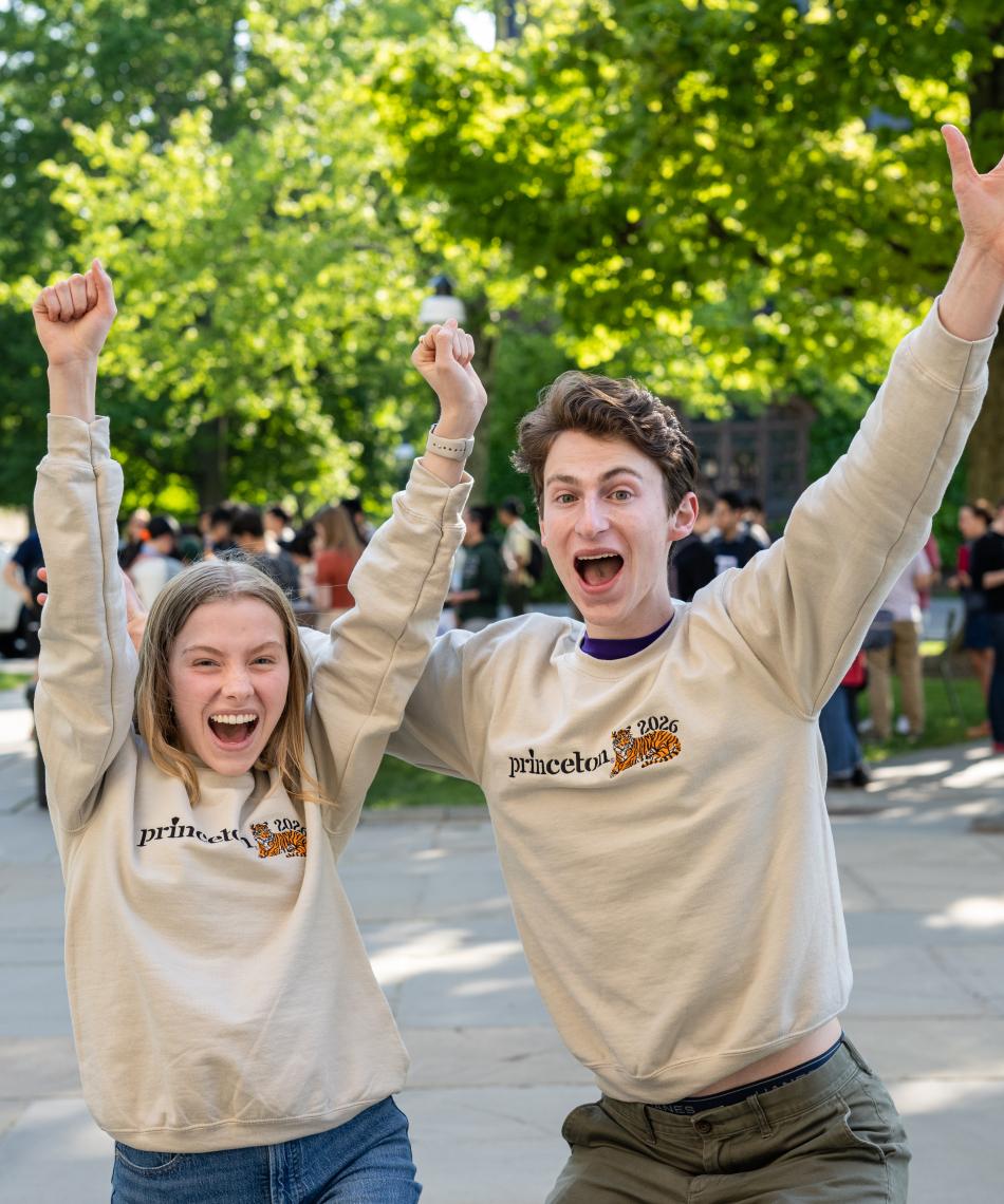 Two students cheering