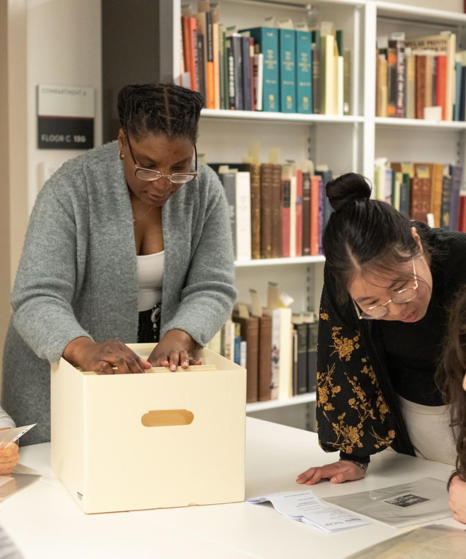 Students sorting through archives