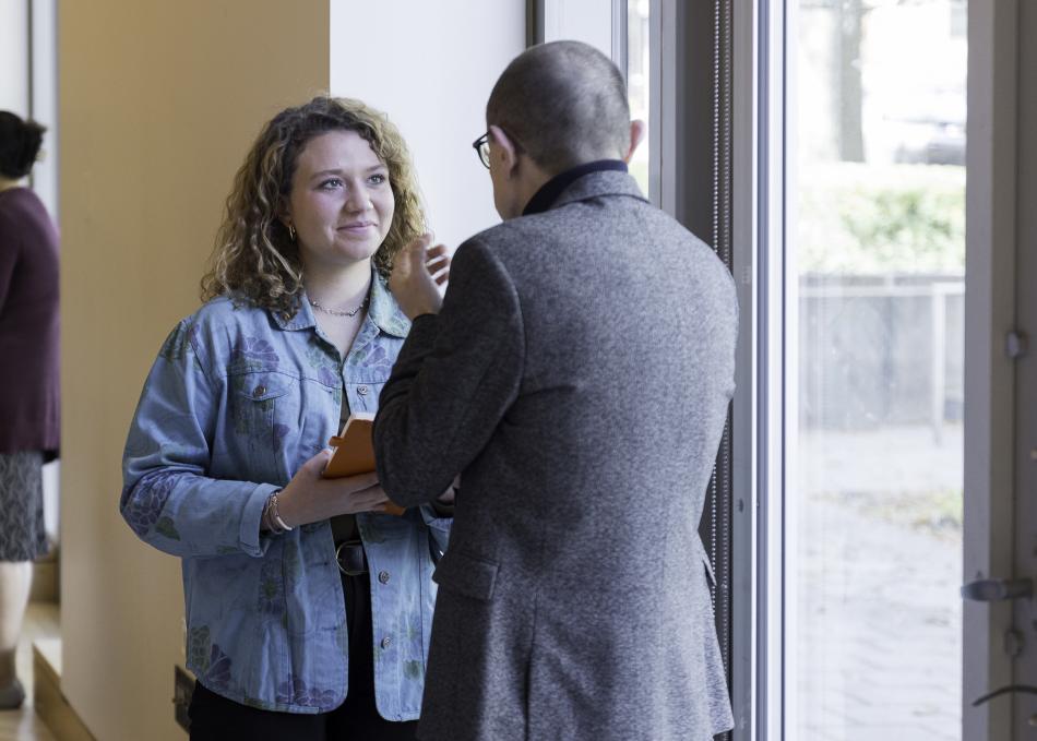 Student Chatting with Guest