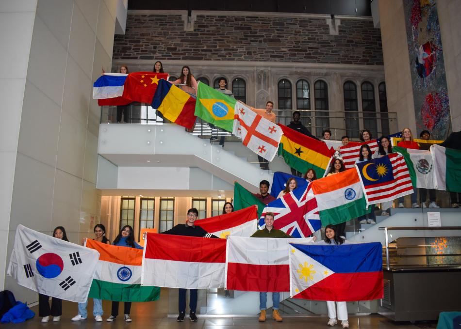Students holding flags