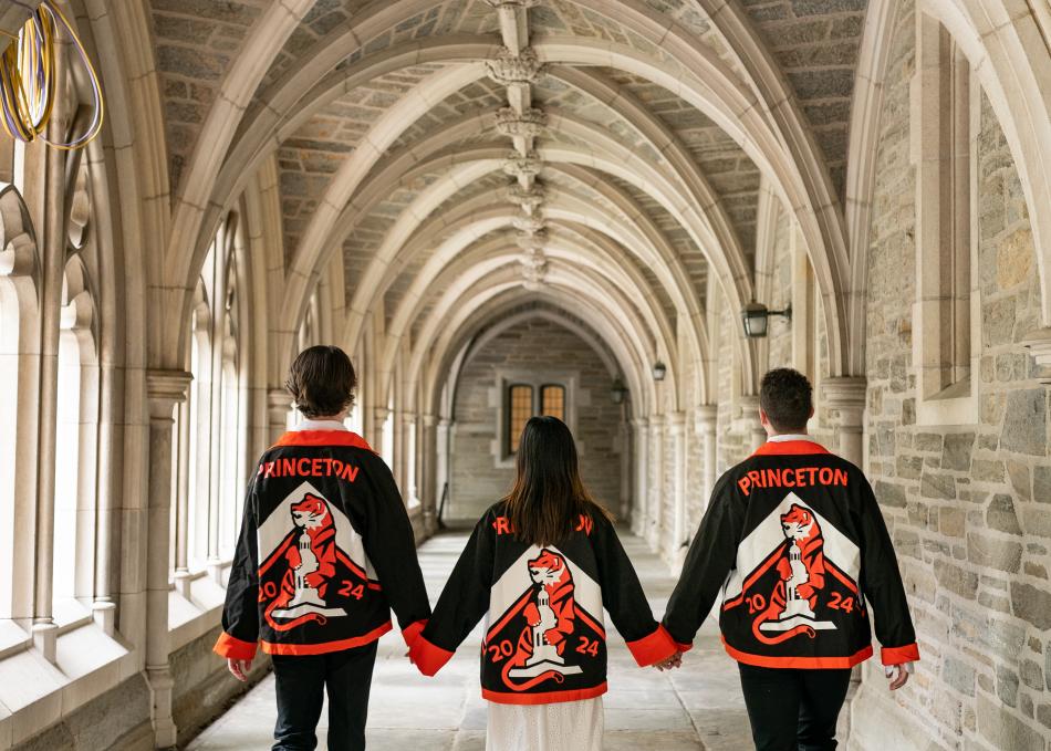 Students walking with Princeton jackets