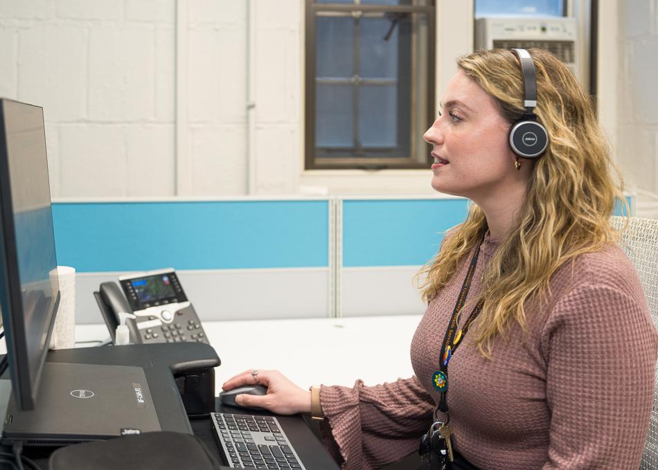 Student looking at a computer