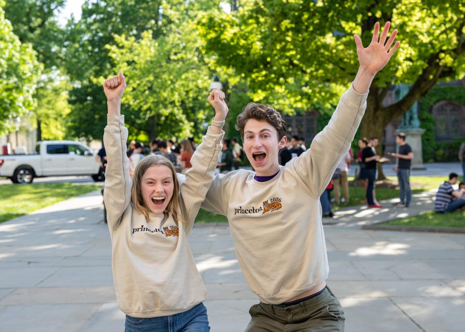 Two students cheering