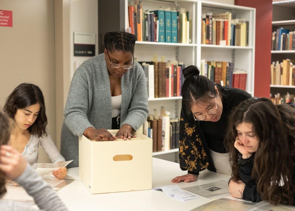 Students sorting through archives